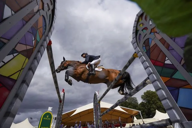 Mario Deslauriers ridding Bardolina 2 competes in the Rolex Grand Prix at the Royal Windsor Horse Show, Windsor on Sunday, July 4, 2021. (Photo by Steve Parsons/PA Images via Getty Images)