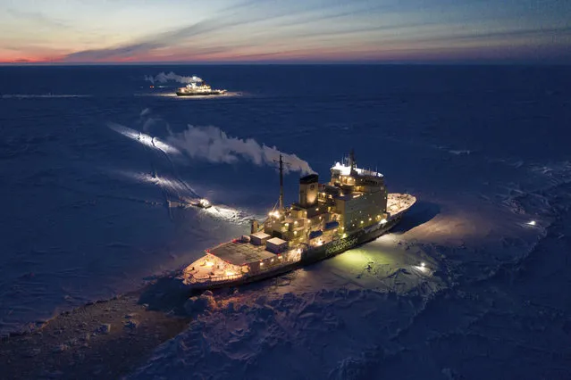 In this Friday, February 28, 2020 photo provided by the Alfred-Wegener-Institute the icebreakers Kapitan Dranitysn, front, and Polarstern, rear, are pictured in the Arctic ice. (Photo by Steffen Graupner/Alfred-Wegener-Institute via AP Photo)