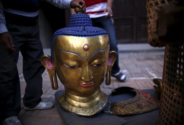 An idol of Buddha is pictured during the Samyak festival in Lalitpur, Nepal, March 11, 2016. (Photo by Navesh Chitrakar/Reuters)
