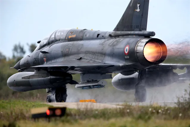 A French Air Force Mirage 2000 fighter jet takes off during the close air support (CAS) exercise Serpentex 2016 hosted by France in the Mediterranean island of Corsica, at Solenzara air base, March 17, 2016. (Photo by Charles Platiau/Reuters)