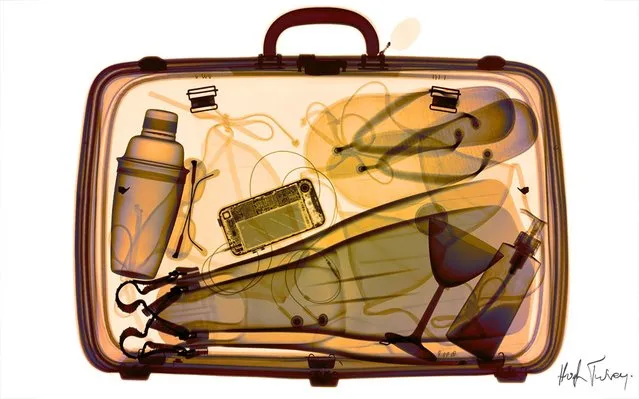 An x-ray of a packed suitcase, taken by British artist and photographer Hugh Turvey in London, England. (Photo by Hugh Turvey/SPL/Barcroft Media)
