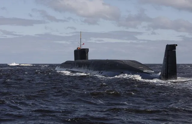 In this file photo taken on Thursday, July 2, 2009,  the Russian nuclear submarine, Yuri Dolgoruky, is seen during sea trials near Arkhangelsk, Russia.  The Russian navy said in a statement Friday March 31, 2017,  that its submarines have increased combat patrols to the level last seen during the Cold War. (Photo by Alexander Zemlianichenko/AP Photo)