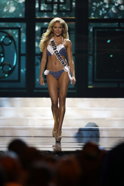 Miss North Carolina, Julia Dalton, competes in the bathing suit competition during the preliminary round of the 2015 Miss USA Pageant in Baton Rouge, La., Wednesday, July 8, 2015. (Photo by Gerald Herbert/AP Photo)