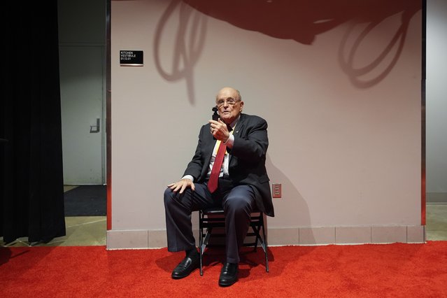 Former New York Mayor Rudy Giuliani plays with a video camera before the Republican National Convention Tuesday, July 16, 2024, in Milwaukee. (Photo by Paul Sancya/AP Photo)