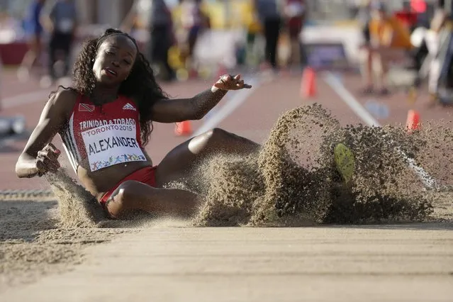 Trinidad and Tobago's Ayanna Alexander compites on the women's triple jump at the Pan Am Games in Toronto, Ontario, Tuesday, July 21, 2015. (Photo by Felipe Dana/AP Photo)