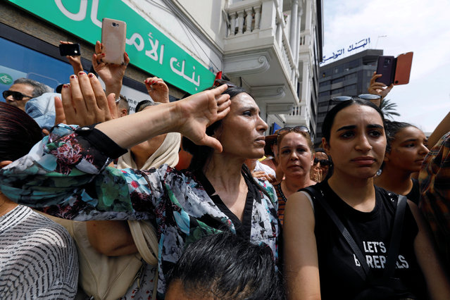 A woman reacts during the funeral of Tunisian President Beji Caid Essebsi in Tunis, Tunisia on July 27, 2019. (Photo by Zoubeir Souissi/Reuters)