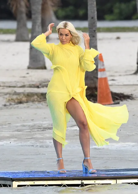 Singer Rita Ora, 29, was caught out by an ocean breeze as she filmed a shoe ad – just like Marilyn was by a subway breeze in her famed flying skirt photo – on Miami Beach, south Florida on January 11, 2020. (Photo by The Mega Agency)