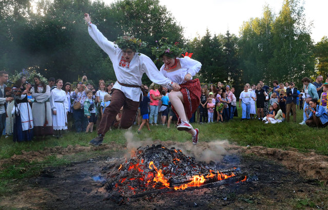 People take part in the celebrations of the Ivan Kupala festival in Minsk, Belarus, July 8, 2023. (Photo by Xinhua News Agency/Rex Features/Shutterstock)