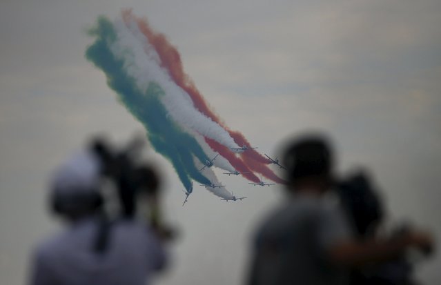 Italian Frecce Tricolori, the aerobatic demonstration team of the Italian Aeronautica Militare (Air Force) performs during the Radom Air Show at an airport in Radom, Poland August 23, 2015. (Photo by Kacper Pempel/Reuters)