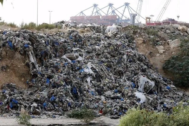 A general view shows a garbage filled-area on the bank of Beirut river, Lebanon August 24, 2015. (Photo by Mohamed Azakir/Reuters)