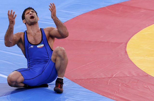 Iran's Saeid Morad Abdvali reacts after been defeated by France's Steeve Guenot on the Men's 66Kg Greco-Roman wrestling at the ExCel venue during the London 2012 Olympic Games August 7, 2012. (Photo by Kim Kyung-Hoon/Reuters)