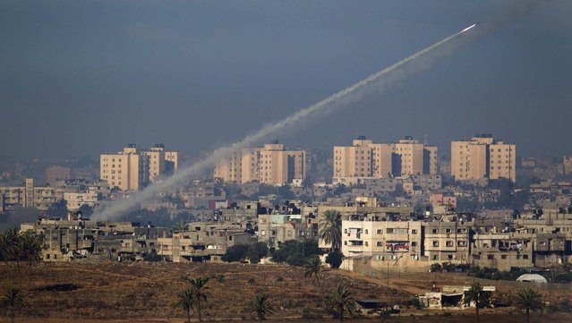 A rocket is launched towards Israel by Palestinian militants from the northern Gaza Stripl,Thursday, November 15, 2012. (Photo by Ariel Schalit/Associated Press)