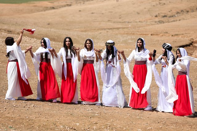 Yazidis gather to celebrate the Yazidi New Year in Amuda, Syria on April 16, 2025. (Photo by Orhan Qereman/Reuters)