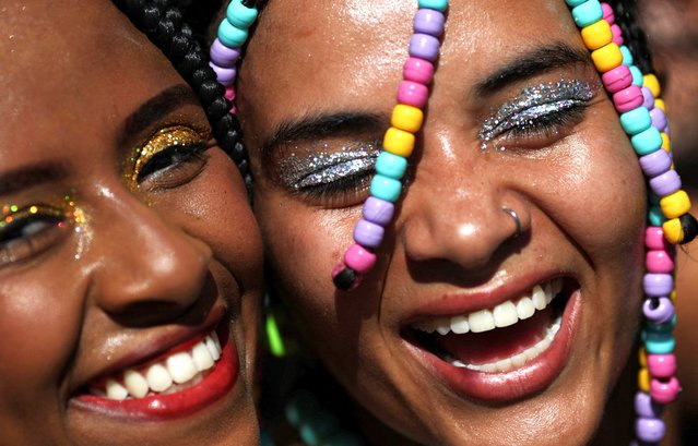 Revellers attend the annual block party 'Amigos da Onca' during the Carnival festivities in Rio de Janeiro, Brazil, on February 10, 2024. (Photo by Ricardo Moraes/Reuters)