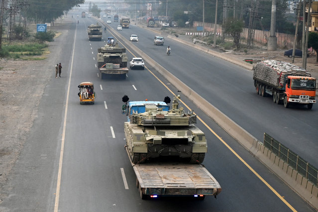 Tanks are transported on a road in Muridke near Lahore, Pakistan on May 7, 2025. (Photo by Reuters/Stringer)