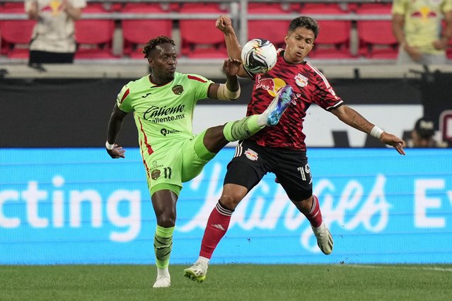 Juárez's José Luis Rodríguez (11) battles for the ball with New York Red Bulls's Wikelman Carmona (19) during the first half of a Leagues Cup soccer match Thursday, August 7, 2025, in Harrison, N.J. (Photo by Frank Franklin II/AP Photo)