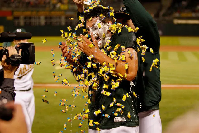 Oakland Athletics pitcher Sean Manaea (55) celebrates with teammates after throwing a no hitter against the Boston Red Sox at Oakland Coliseum in Oakland, CA, USA on April 21, 2018. (Photo by Kiel Maddox/Reuters/USA TODAY Sports)