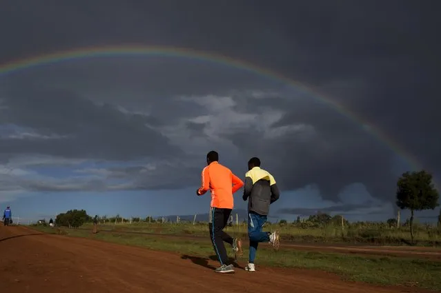 Athletes run during a training session near the town of Iten in western Kenya, November 12, 2015. In Kenya's running heartlands, a spate of failed drug tests has fuelled fears the East African nation could follow Russia in being suspended from world athletics over doping violations, threatening the region's economic lifeline. (Photo by Siegfried Modola/Reuters)