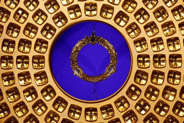 The Holy Crown of Thorns is reserved and exhibited in a remainder after a procession for its return at the Notre-Dame de Paris Cathedral, five-and-a-half years after a fire ravaged the Gothic masterpiece, as part of ceremonies to mark the Cathedral's reopening after its restoration, in Paris, France, on December 13, 2024. (Photo by Stephanie Lecocq/Reuters)