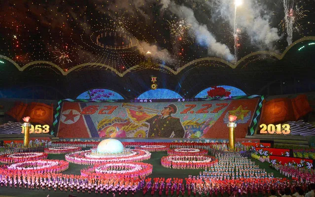 North Koreans perform during the Arirang Mass Games at the May Day Stadium in Pyongyang, as part of celebrations ahead of the 60th anniversary marking the end of the 1950-53 Korean War, in this photo taken by Kyodo July 22, 2013. (Photo by KYODO)