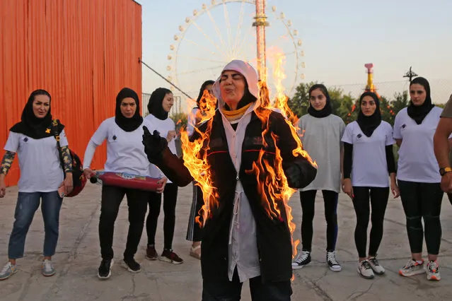 30-year-old Nasrin Teymouri, Iranian stunt woman and supervisor of the first female stunt team in Iran, named Kheybar, teaches techniques of her profession to female stunt performers in Tehran, Iran on August 15, 2023. Teymouri, also an official member of the Iran Cinema House, form a team of female stunt performers in 2022 in order to encourage them to gain self-confidence to pursue action work. Teymouri trains her fellows so that female stuntmen as well as men can take part in Iranian Cinema. (Photo by Fatemeh Bahrami/Anadolu Agency via Getty Images)