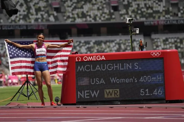 Gold medalist Sydney McLaughlin, of the United States, celebrates after winning the women's 400-meter hurdles at the 2020 Summer Olympics, Wednesday, August 4, 2021, in Tokyo, Japan. (Photo by Petr David Josek/AP Photo)