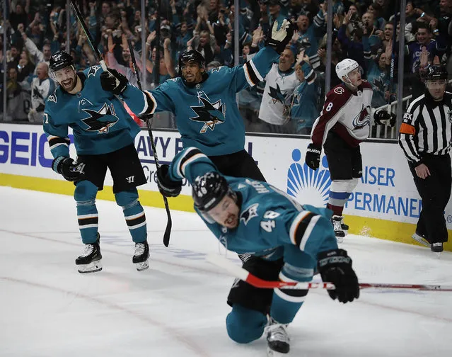 San Jose Sharks' Joonas Donskoi, left, and Evander Kane celebrate a goal by Tomas Hertl (48) during the third period of Game 5 of the team's NHL hockey second-round playoff series against the Colorado Avalanche on Saturday, May 4, 2019, in San Jose, Calif. (Photo by Ben Margot/AP Photo)