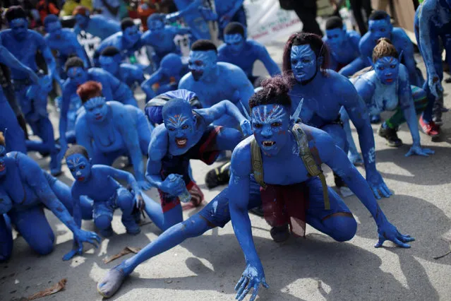 Revellers in costumes representing characters of the movie “Avatar” take part in the parade during the celebration of the Carnival in Jacmel, Haiti, February 19, 2017. (Photo by Andres Martinez Casares/Reuters)