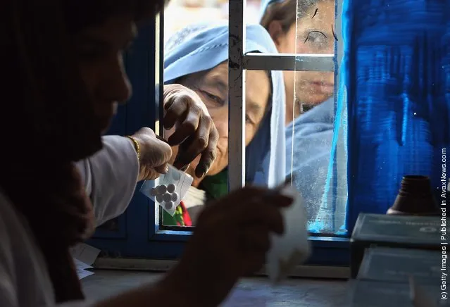 Afghan women receive prescription medicine