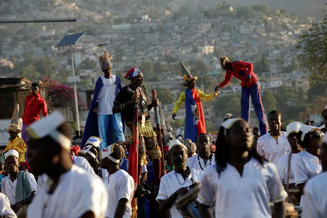 Revellers walking on stilts parade along a street at the Carnival of Port-au-Prince, Haiti, February 27, 2017. (Photo by Andres Martinez Casares/Reuters)