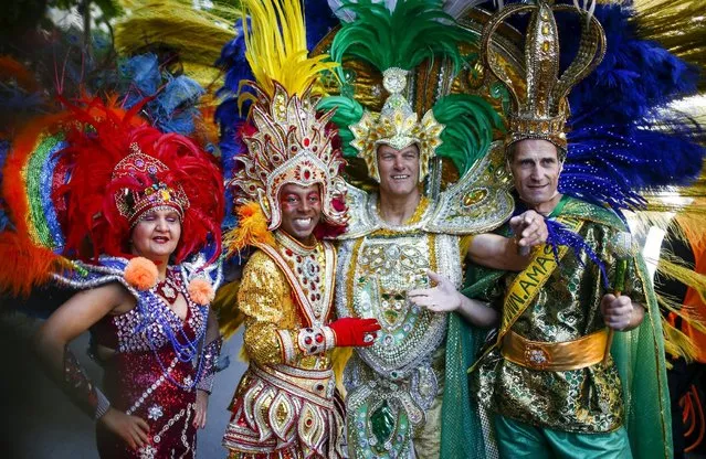 Dancers take part in the Karneval der Kulturen (Carnival of Cultures) street parade of ethnic minorities, in Berlin, Germany, May 24, 2015. A few dozen dancers, musicians and performers from dozens of communities took part in the urban festival on Sunday that aspires to reflect the multi-ethnic diversity of the German capital. (Photo by Hannibal Hanschke/Reuters)