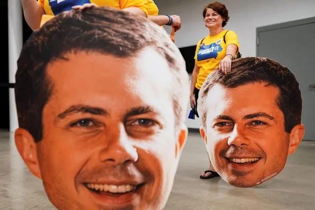 Two supporters hold large cutouts of Pete heads at a campaign event for Pete Buttigieg, South Bend Mayor and Democratic presidential hopeful in Newton, Iowa, U.S. September 21, 2019. (Photo by Elijah Nouvelage/Reuters)
