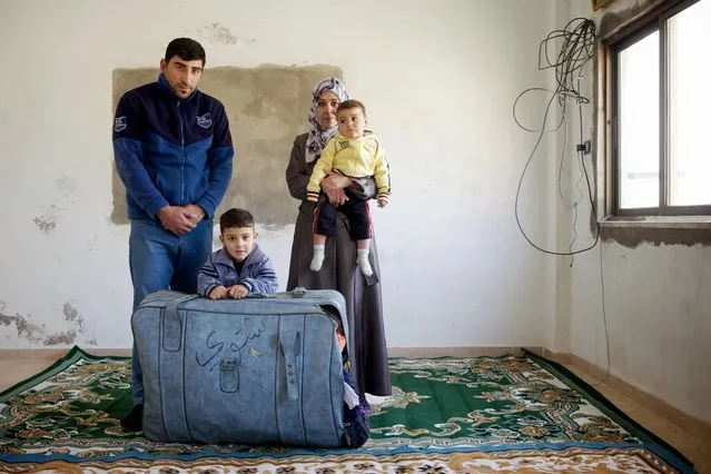 Life in a Suitcase by Richard Wainwright came second in the portrait prize. Zeena, 26, said: “We fled Syria across the border into Jordan and could only carry this suitcase with a few clothes and food for the baby. It was cold and dangerous, I cannot explain how awful it’s been for the children”. Her family are struggling to survive in Amman after fleeing Homs, where their house and bakery was destroyed. (Photo by Richard Wainwright/Head On)