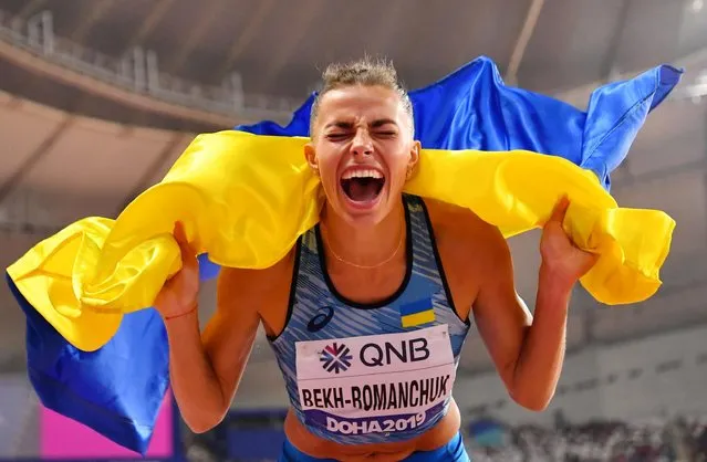 Ukraine's Maryna Bekh-Romanchuk celebrates winning silver in the women's long jump final at the World Athletics Championships in Doha, October 6, 2019. (Photo by Dylan Martinez/Reuters)