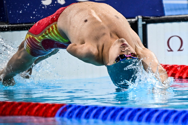 China’s athlete Fengqi Liu competes during the men's 100m backstroke - S8 final at the Paris 2024 Paralympic Games, in the Paris La Defense Arena, Nanterre, west of Paris, on August 31, 2024. (Photo by Julien de Rosa/AFP Photo)