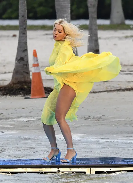Singer Rita Ora, 29, was caught out by an ocean breeze as she filmed a shoe ad – just like Marilyn was by a subway breeze in her famed flying skirt photo – on Miami Beach, south Florida on January 11, 2020. (Photo by The Mega Agency)