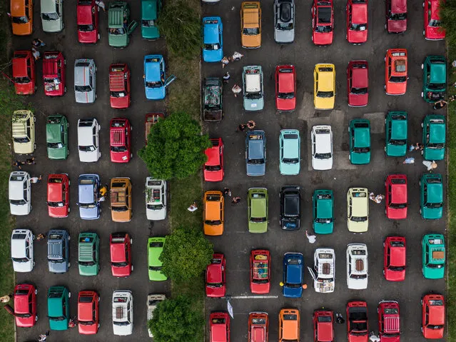 An aerial view of hundreds of Fiat 126 and their owners during an attempt to establish the national record on Fiat 126 gathering in Myslowice, Poland on June 25, 2022.  More than 320 Fiat 126 models came from all over the country to establish the national record. (Photo by Omar Marques/Anadolu Agency via Getty Images)