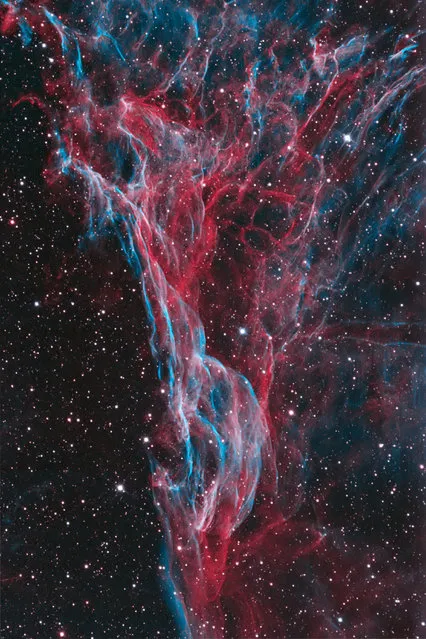 “Pickering’s Triangle”. The luminous tangle of filaments of Pickering’s Triangle intertwines through the night sky. Located in the Veil Nebula, it is one of the main visual elements of a supernova remnant, whose source exploded around 8,000 years ago. (Photo by Bob Franke/Royal Observatory Greenwich’s Astronomy Photographer of the Year 2016/National Maritime Museum)