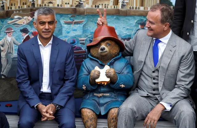 London Mayor Sadiq Khan joins actor Hugh Bonneville to launch “Paddington's Pop-Up London” at an event to promote the movie, Paddington 2 in London, Britain October 19, 2017. (Photo by Peter Nicholls/Reuters)
