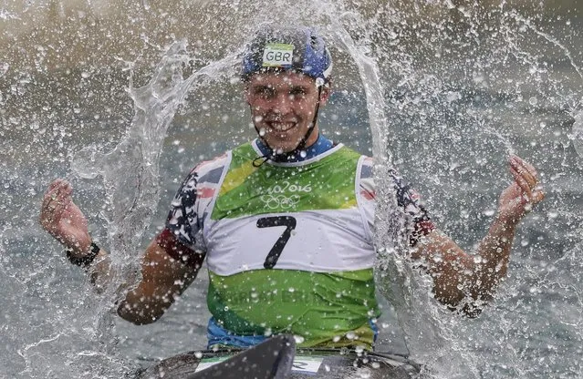 Joseph Clarke, of Britain, celebrates winning the gold medal in the kayak K1 men's final of the canoe slalom at the 2016 Summer Olympics in Rio de Janeiro, Brazil, Wednesday, August 10, 2016. (Photo by Kirsty Wigglesworth/AP Photo)