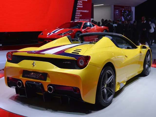 The new Ferrari 458 M is presented at the 2014 Paris Auto Show on October 2, 2014 in Paris, on the first of the two press days. (Photo by Miguel Medina/AFP Photo)