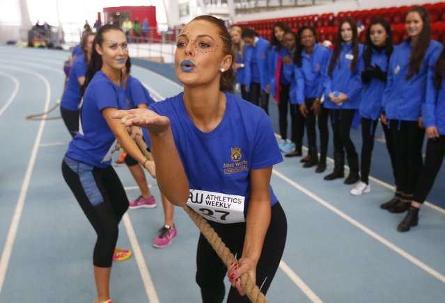 Miss Norway Monica Olivia Pedersen blows a kiss before the tug of war event during the Miss World sports competition at the Lee Valley sports complex in north London, November 26, 2014. (Photo by Andrew Winning/Reuters)