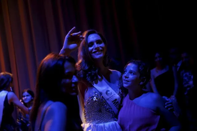 Angela Ponce, 24, poses with supporters after competing in the "Miss World Spain" pageant in Estepona, southern Spain, October 25, 2015. (Photo by Susana Vera/Reuters)