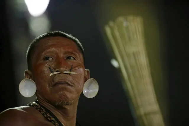 An indigenous man from the Matis tribe is seen at the sports arena during the first World Games for Indigenous Peoples in Palmas, Brazil, October 29, 2015. (Photo by Ueslei Marcelino/Reuters)