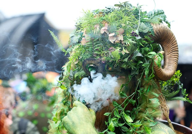 A participant attends the annual May Day bank holiday Jack In The Green parade and festival in Hastings, Britain, on May 6, 2024. (Photo by Toby Melville/Reuters)