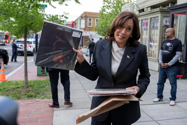 US Vice President Kamala Harris shows records she bought at Home Rule Record store in Washington, DC, USA, 03 May 2023. (Photo by Ken Cedeno/EPA/EFE)