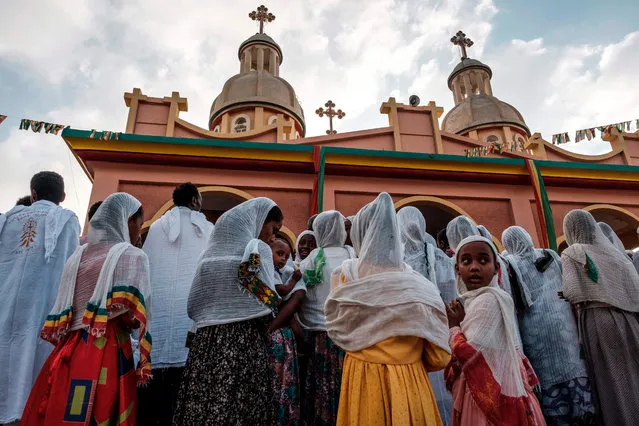 Ethiopian Orthodox worshippers attend a religious service at the Eyesus Church in the city of Alamata, Ethiopia, on December 12, 2020. (Photo by Eduardo Soteras/AFP Photo)