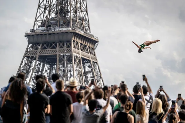 In this handout image provided by Red Bull, Anna Bader of Germany dives from the 21.5 metre platform during the first competition day of the second stop of the Red Bull Cliff Diving World Series on June 17, 2023 at Paris, France. (Photo by Dean Treml/Red Bull via Getty Images)