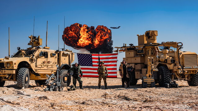 A U.S. Air Force bomb squad have posed for an explosive team picture. Explosive ordnance disposal technicians took time to make an eye-catching photo op during a controlled demolition at Al Udeid Air Base in Qatar on January 10, 2025. It features the 379th Expeditionary Civil Engineer Squadron showing off their protective gear, reinforced vehicles, and remote-controlled bomb disposal robots – along with a C-17 military transport flying in the background. The U.S. Air Force said the “EOD technicians provide explosive threat mitigation using a range of sophisticated equipment such as bomb suits, remote-controlled robots, x-ray systems and chemical detection devices”. (Photo by A1C Zeeshan Naeem/USAF/South West News Service)