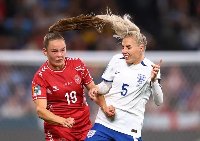 Janni Thomsen of Denmark and Alex Greenwood of England compete for the ball during the FIFA Women's World Cup Australia & New Zealand 2023 Group D match between England and Denmark at Sydney Football Stadium on July 28, 2023 in Sydney, Australia. (Photo by Carl Recine/Reuters)